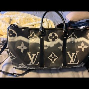 Brand new Louis Vuitton duffel bag never used